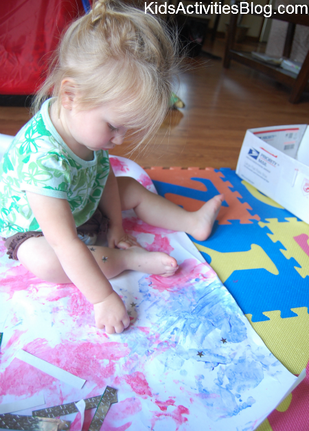little girl with star stickers