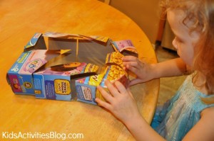 little girl working puzzle