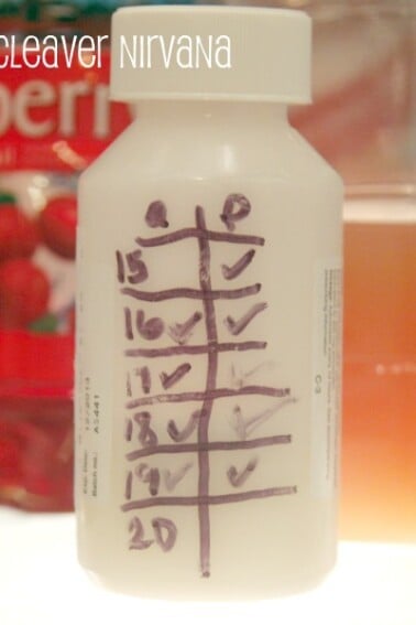 medicine bottle with sharpie schedule on side