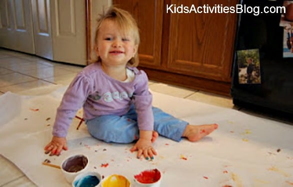 little girl fingerpainting little girl fingerpainting