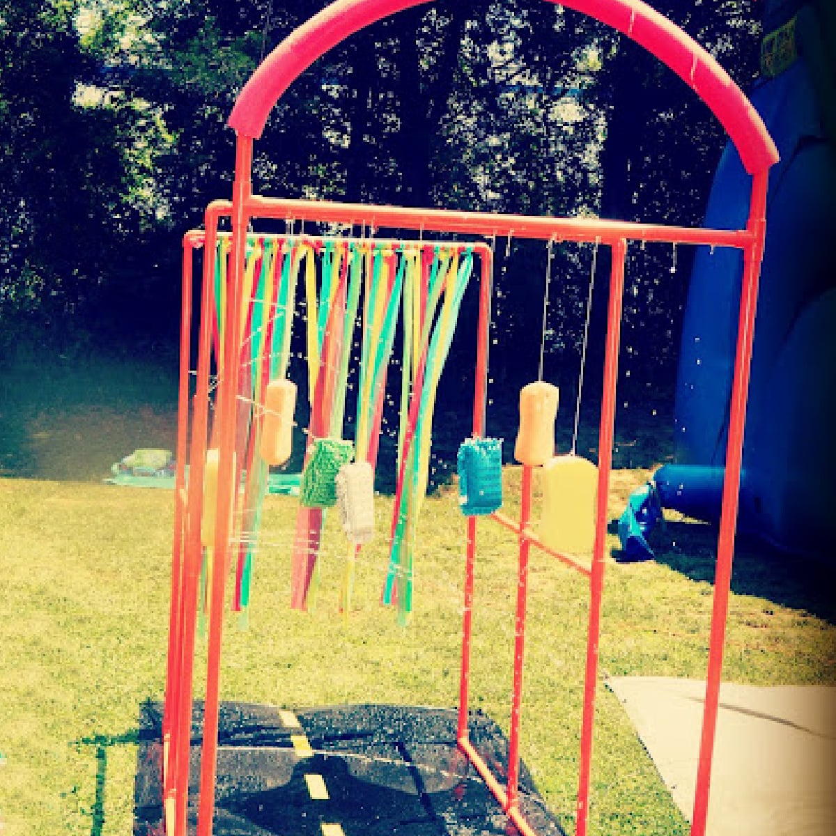 Pool Noodle Activities- Car wash with noodles and pipes- Kids Activities Blog