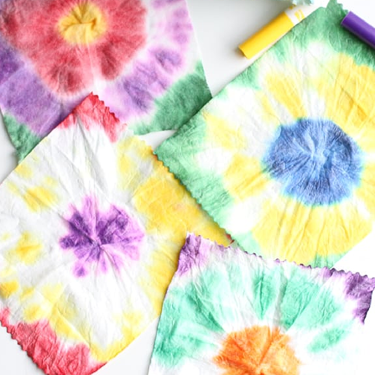 Tie Dye Craft- tie dye baby wipes with yellow blue green red and purple - Kids activities Blog
