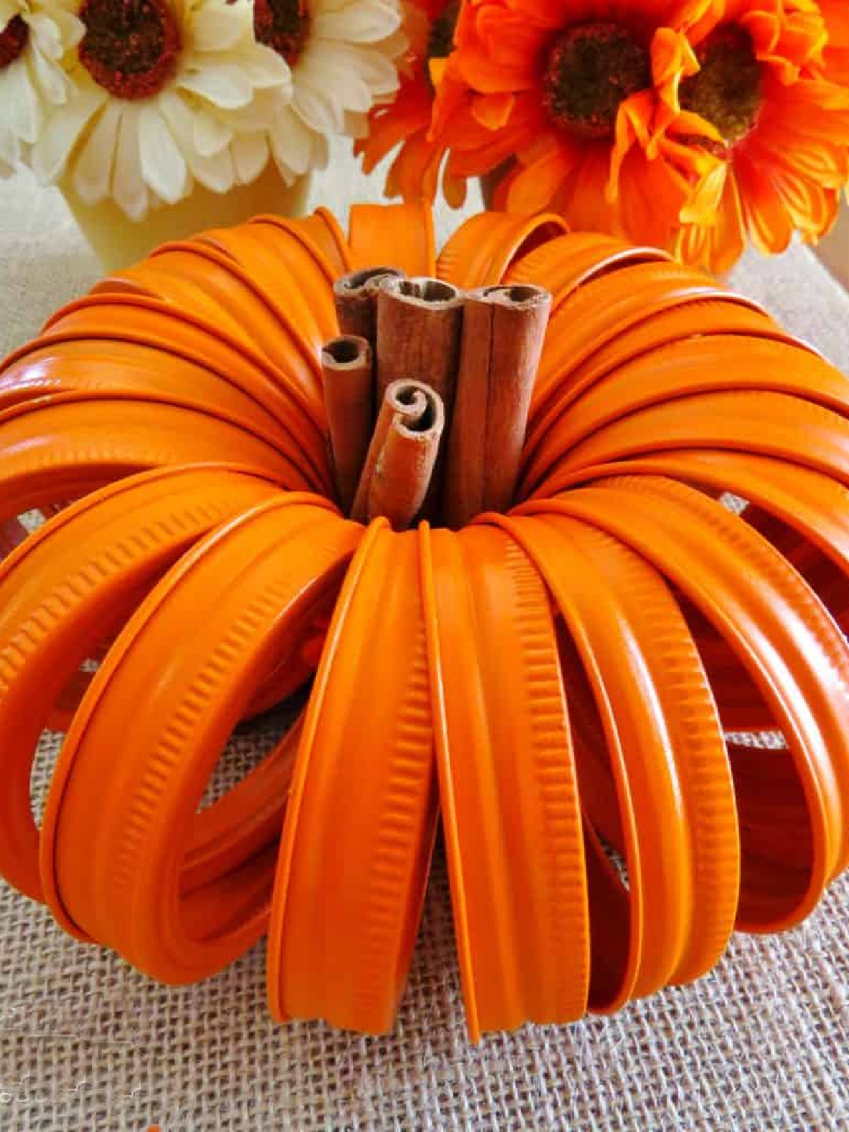 Pumpkin Craft- Tin lid pumpkin with cinnamon stick - Kids Activities Blog
