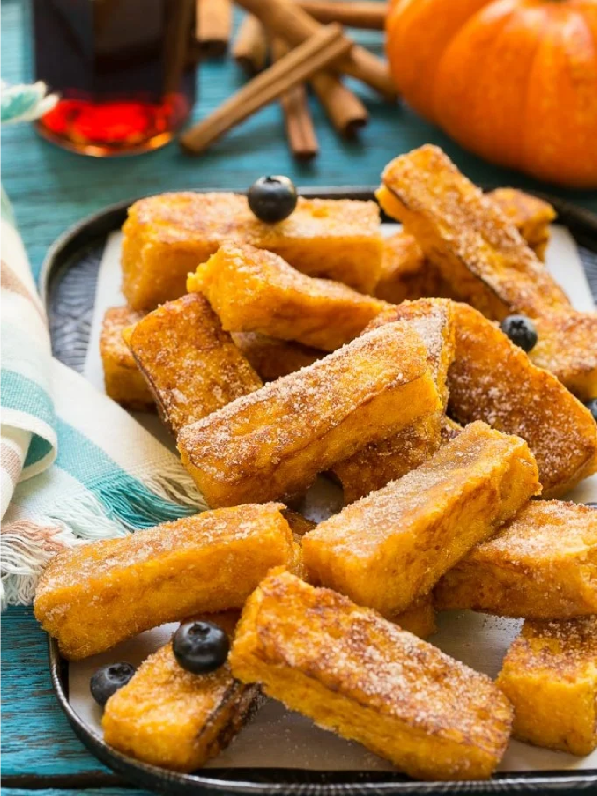 Pumpkin Recipe- Pumpkin churros on a plate with blueberries- Kids Activities Blog