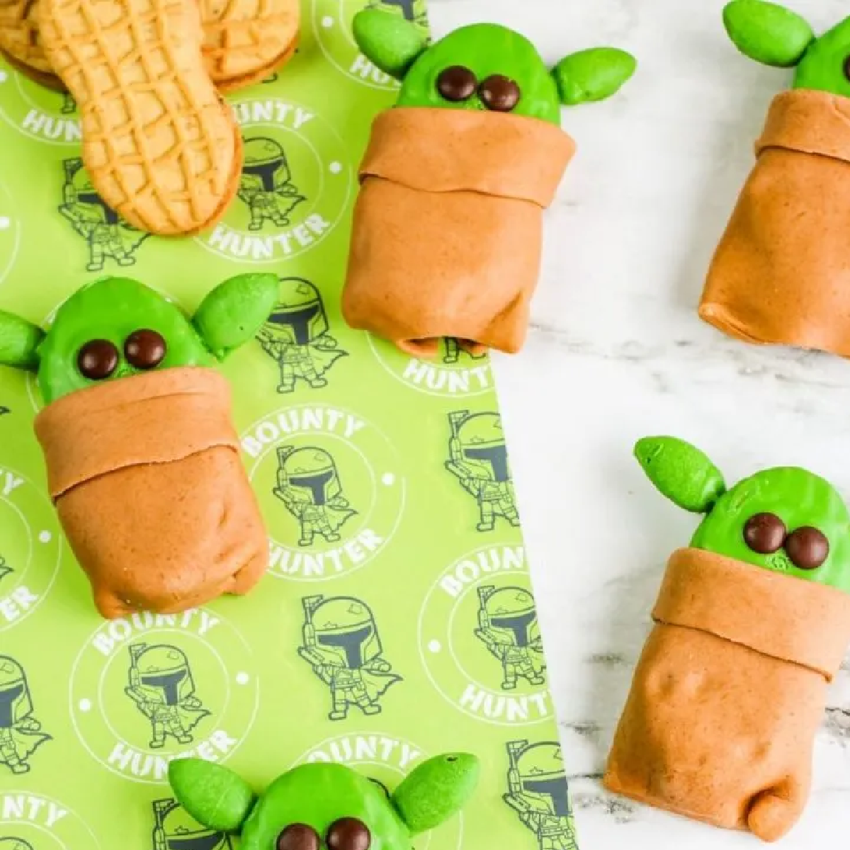 Mandalorian food- nutterbutter cookies that look like baby yoda under a blanket- Kids Activities Blog