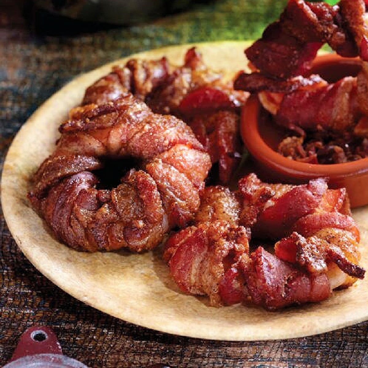 Mandalorian food- Rings of hudulla bacon wrapped onion rings on a plate- Kids Activities Blog