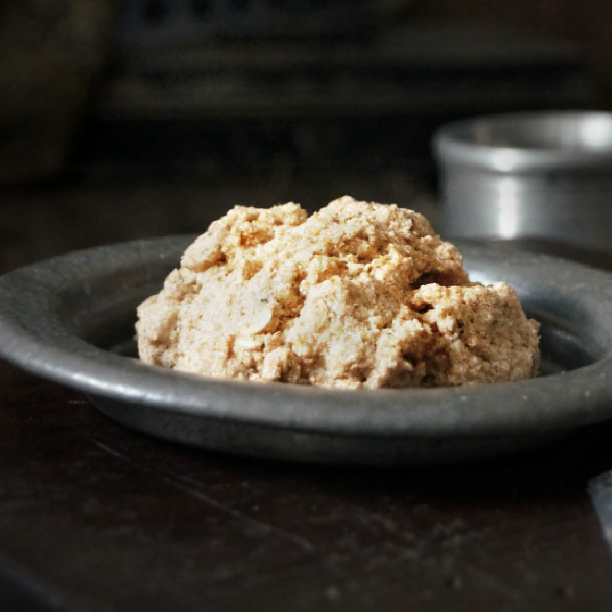 Mandalorian food- Polystarch puffbread, white biscuit on a metal plate- Kids Activities Blog