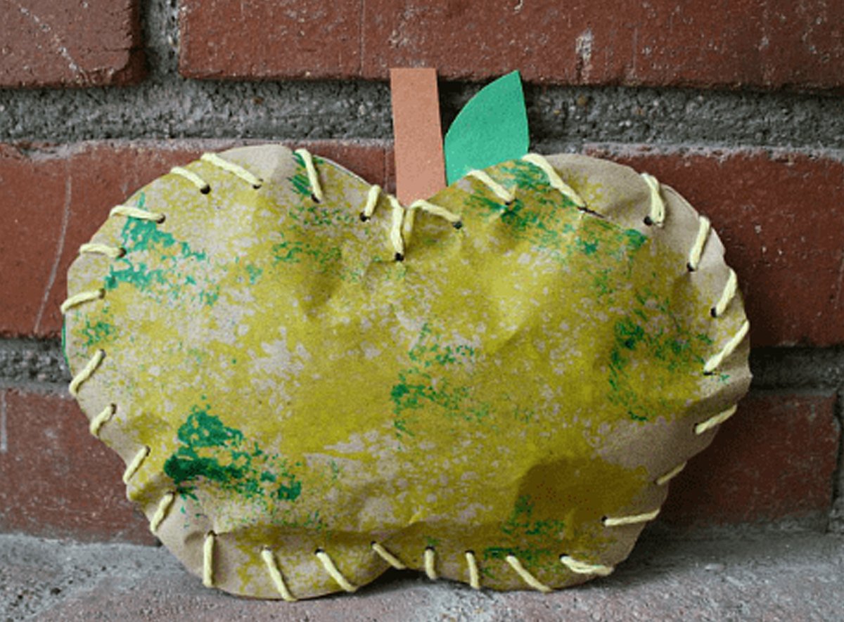 A green apple craft made by children