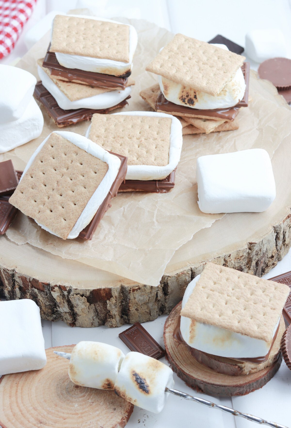 S'mores made in a microwave showcased on a cute wooden table.
