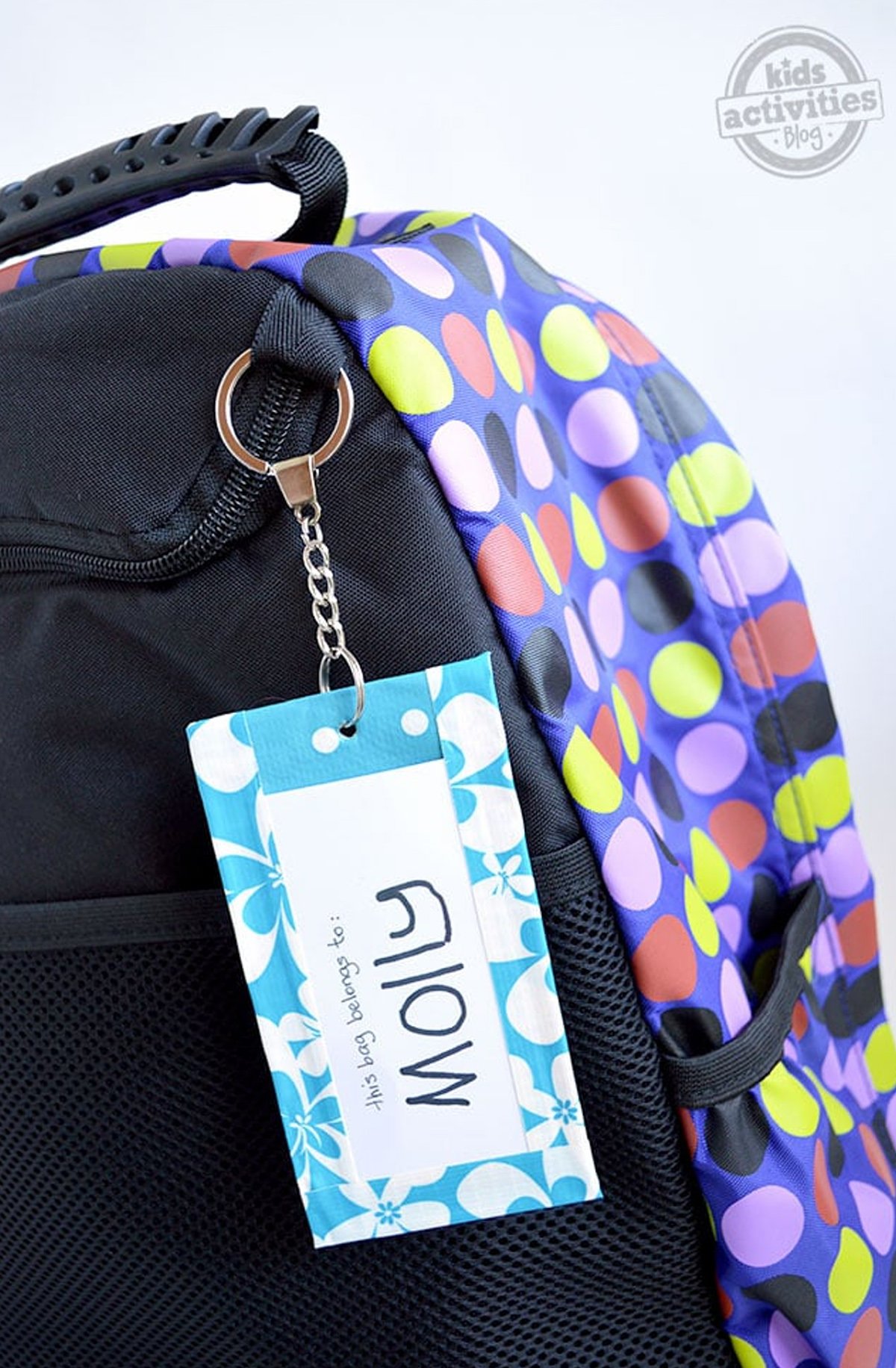 A picture of a DIY backpack tag that says Molly.