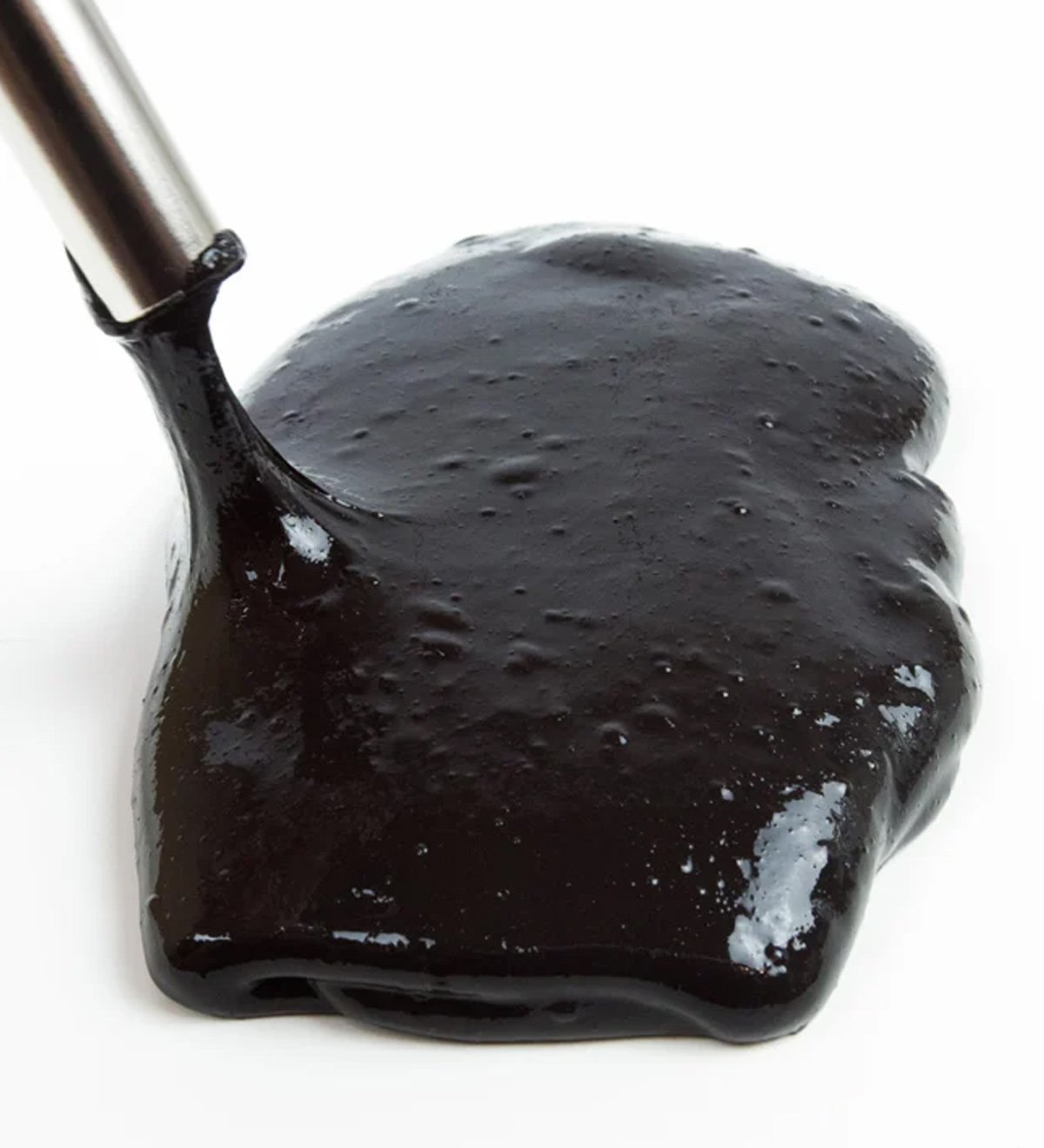 A black magnetic slime made at home.