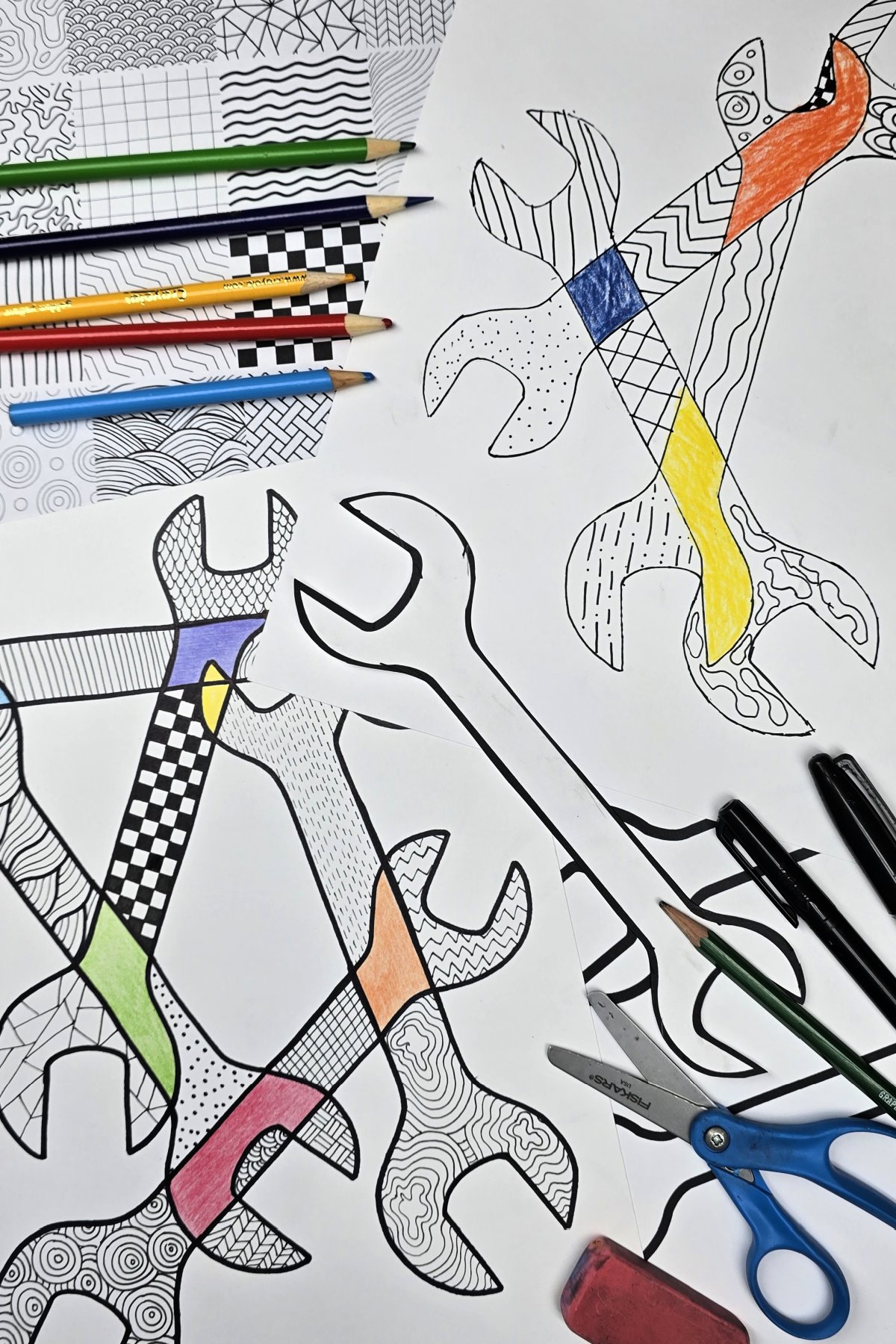 completed overlapping tools zentangle project using permanent markers and colored pencils - kids activities blog
