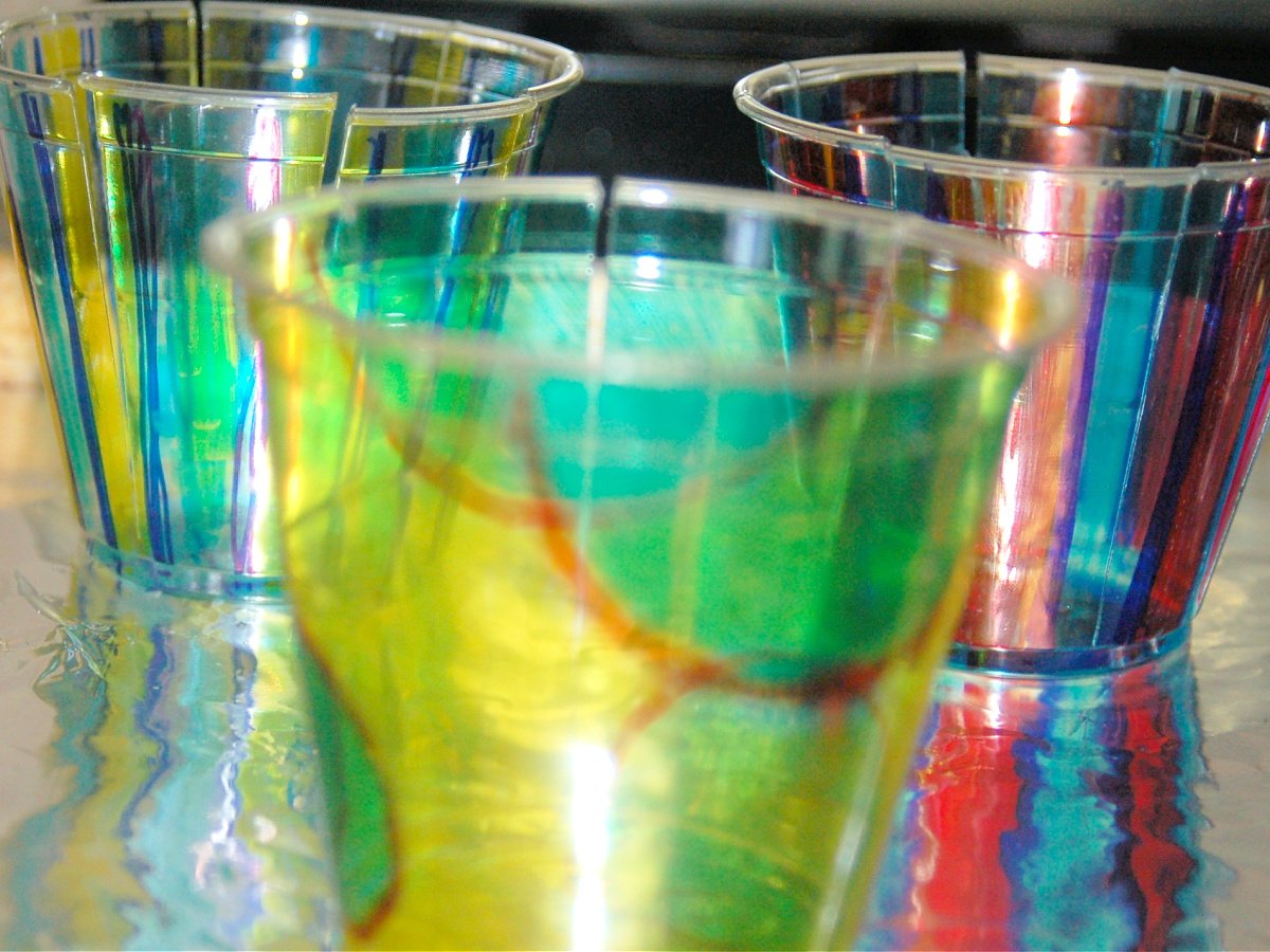 Shrinking Plastic Craft- Step 3- put it on a pan and let it melt for 1-2 minutes- kids activities blog