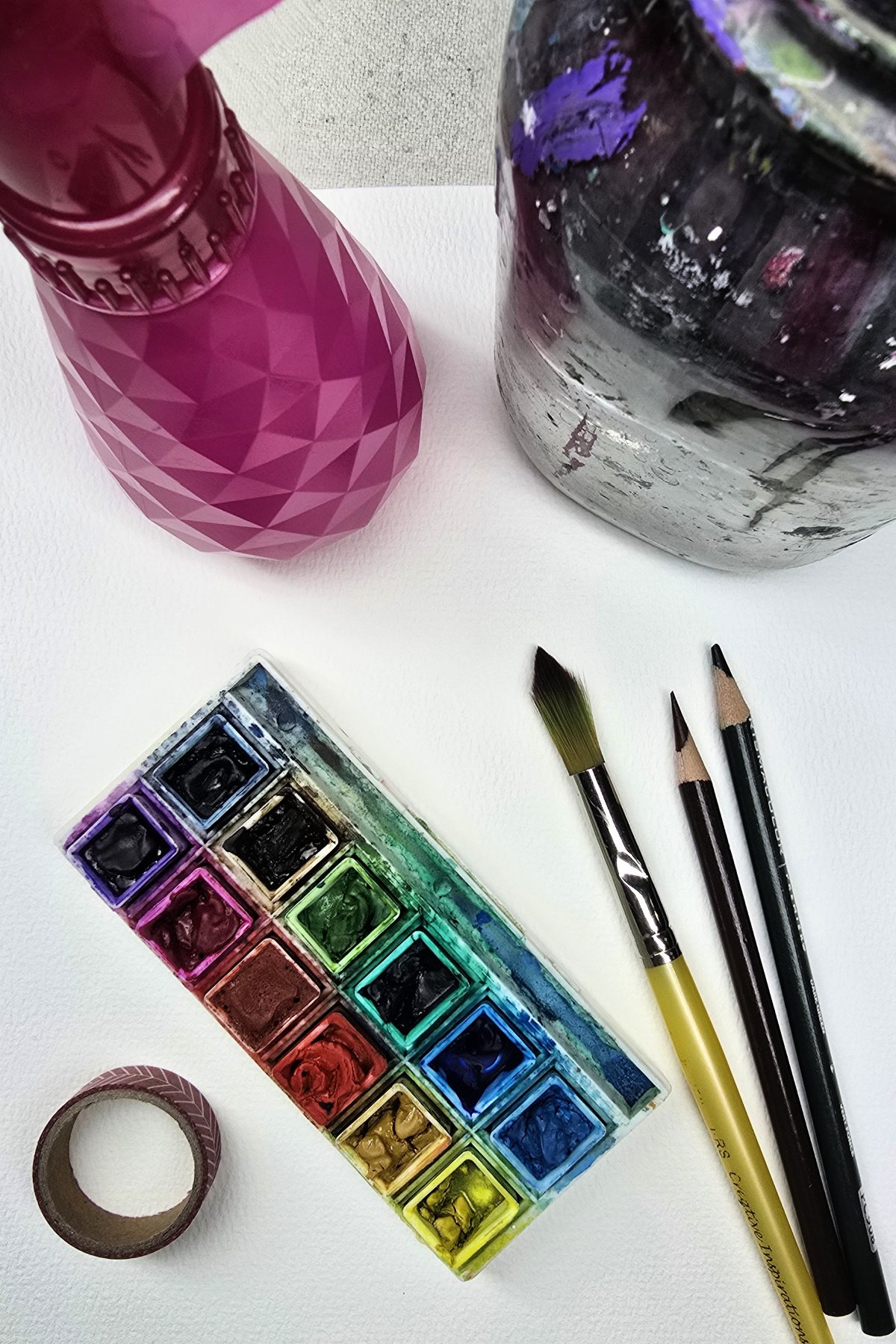 watercolor tree art supplies include watercolor paper, watercolor paints, colored pencils, spray bottle, etc - kids activities blog