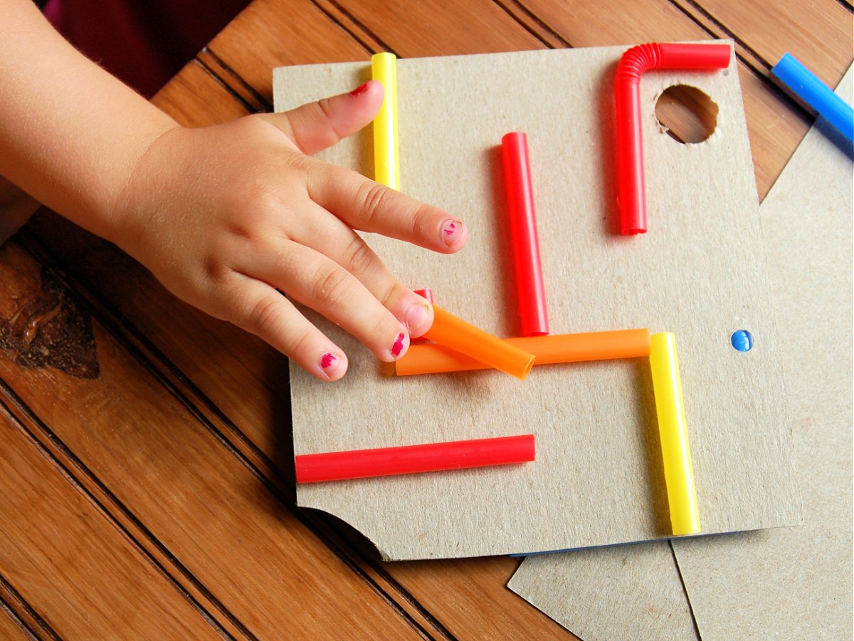 Maze Craft- Step 2 - Glue straws to cardboard - Kids Activities Blog