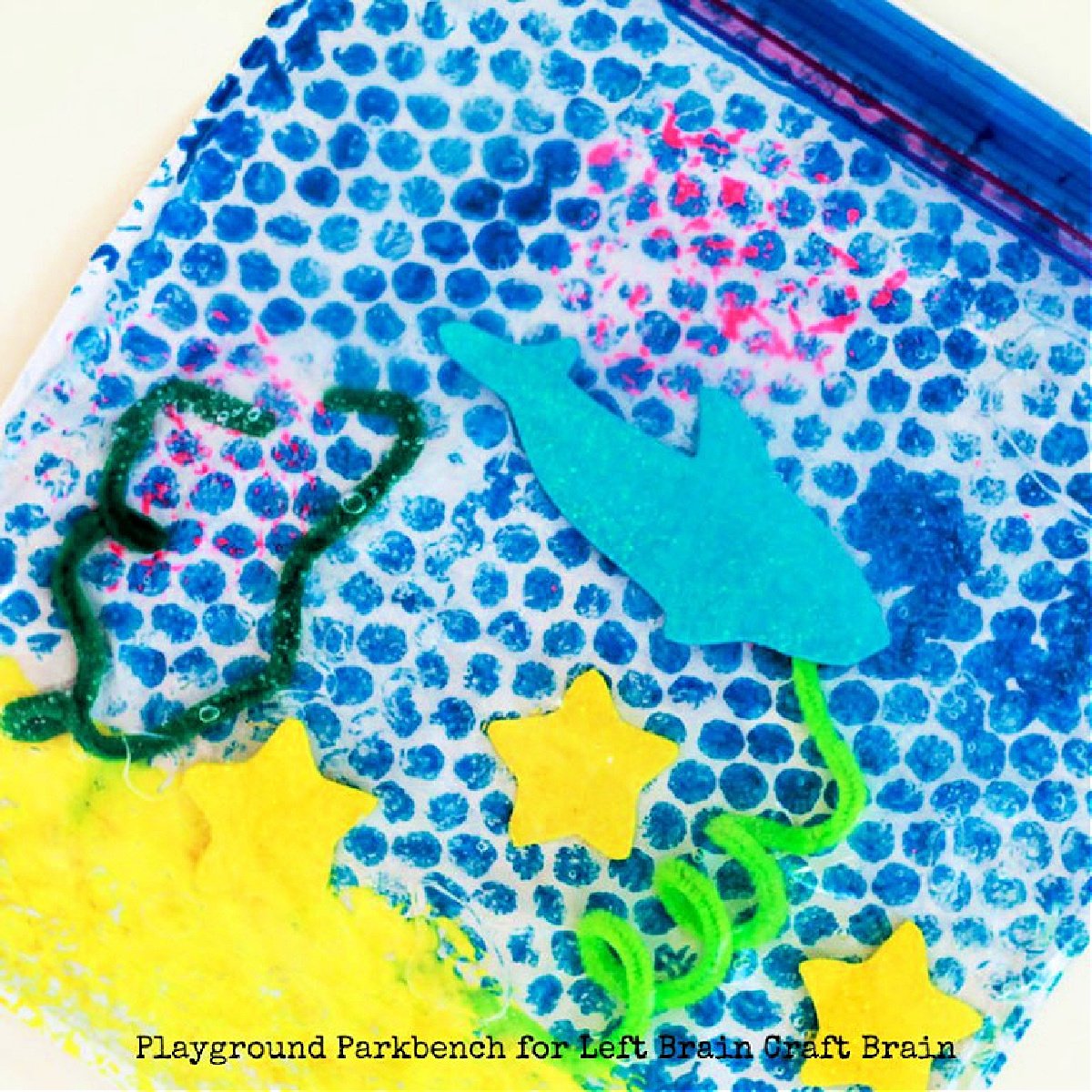 Shark Sensory Bag- Craft bag with paper, foam, paint, and pipe cleaners- kids activities blog