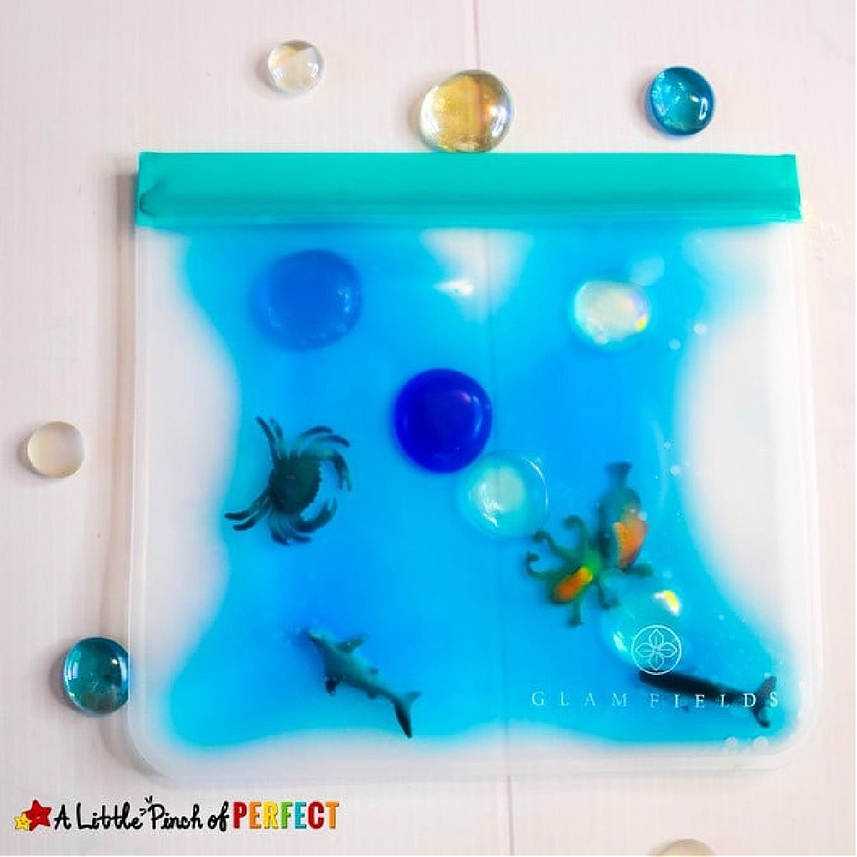 Shark Sensory Bag- Small reusable bag with glass beads, blue, and sea animals- kids activities blog