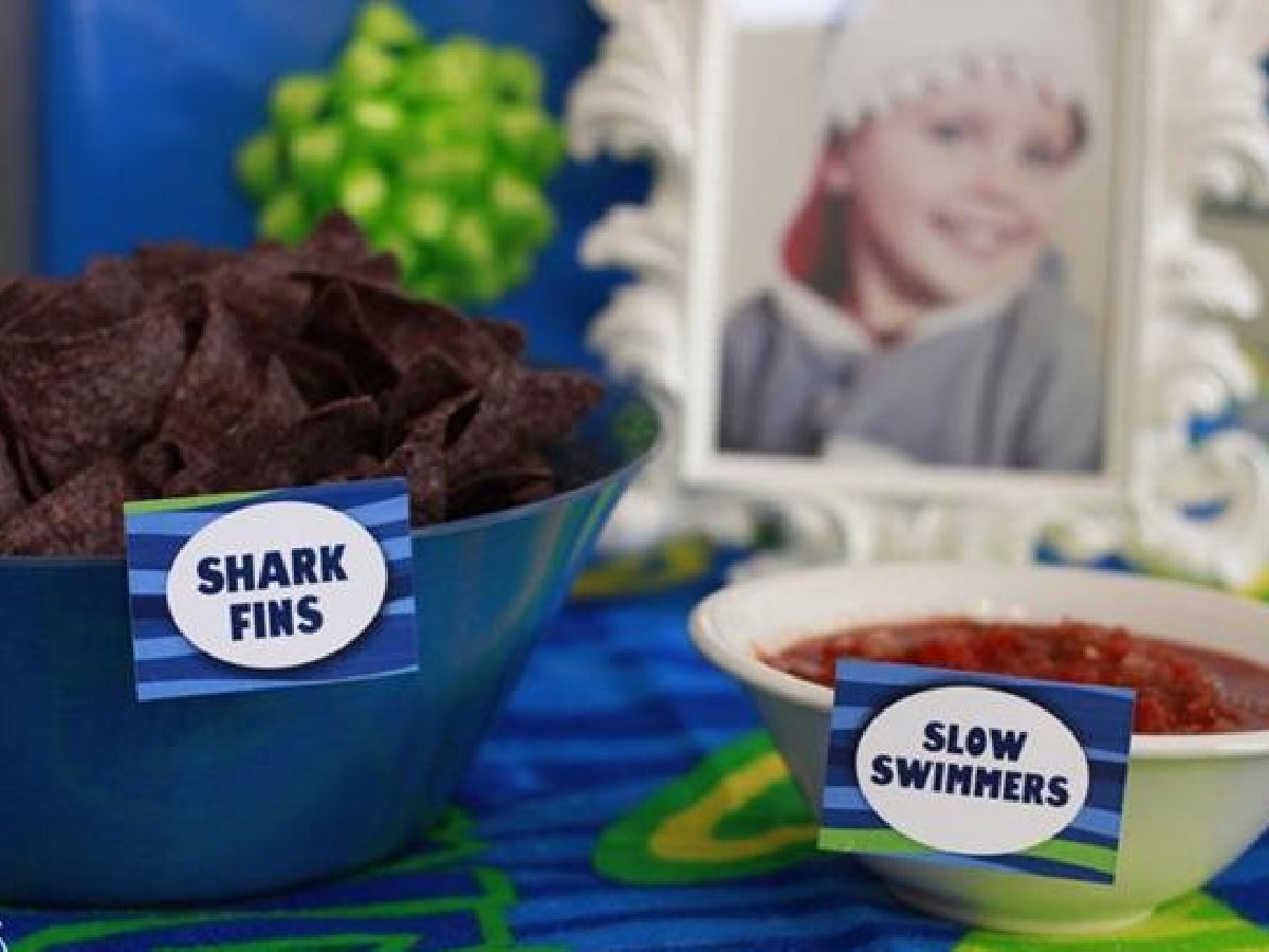 Shark food- chips and salsa labeled shark fins and slow swimmers- kids activities blog
