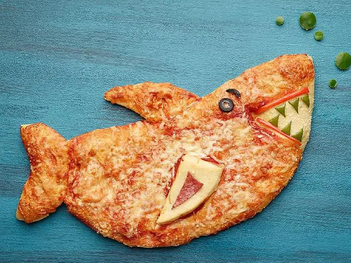 Shark Party- pizza in the shape of a shark with fins and teeth- kids activities blog