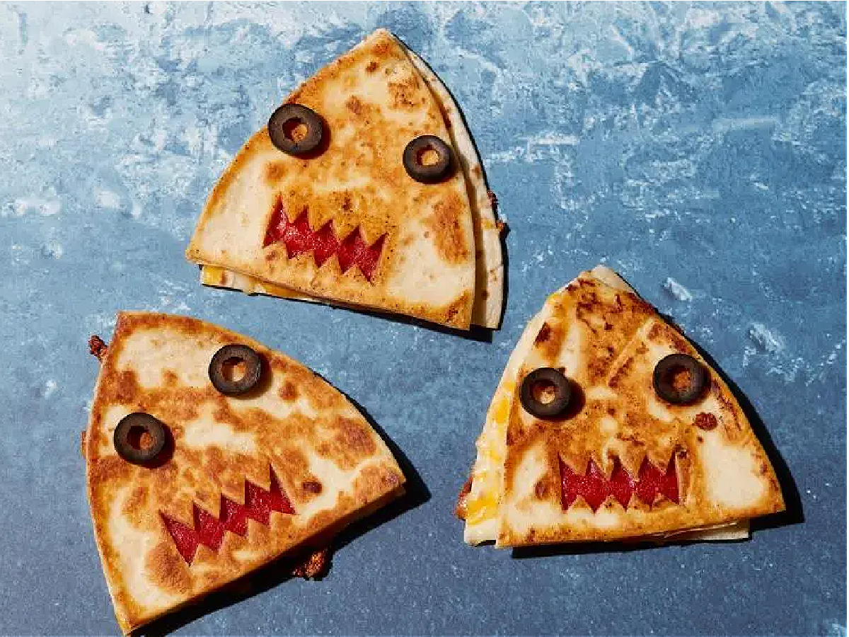 Shark Party- Shark quesadillas cut out of tortillas with teeth and olive eyes- kids activities blog