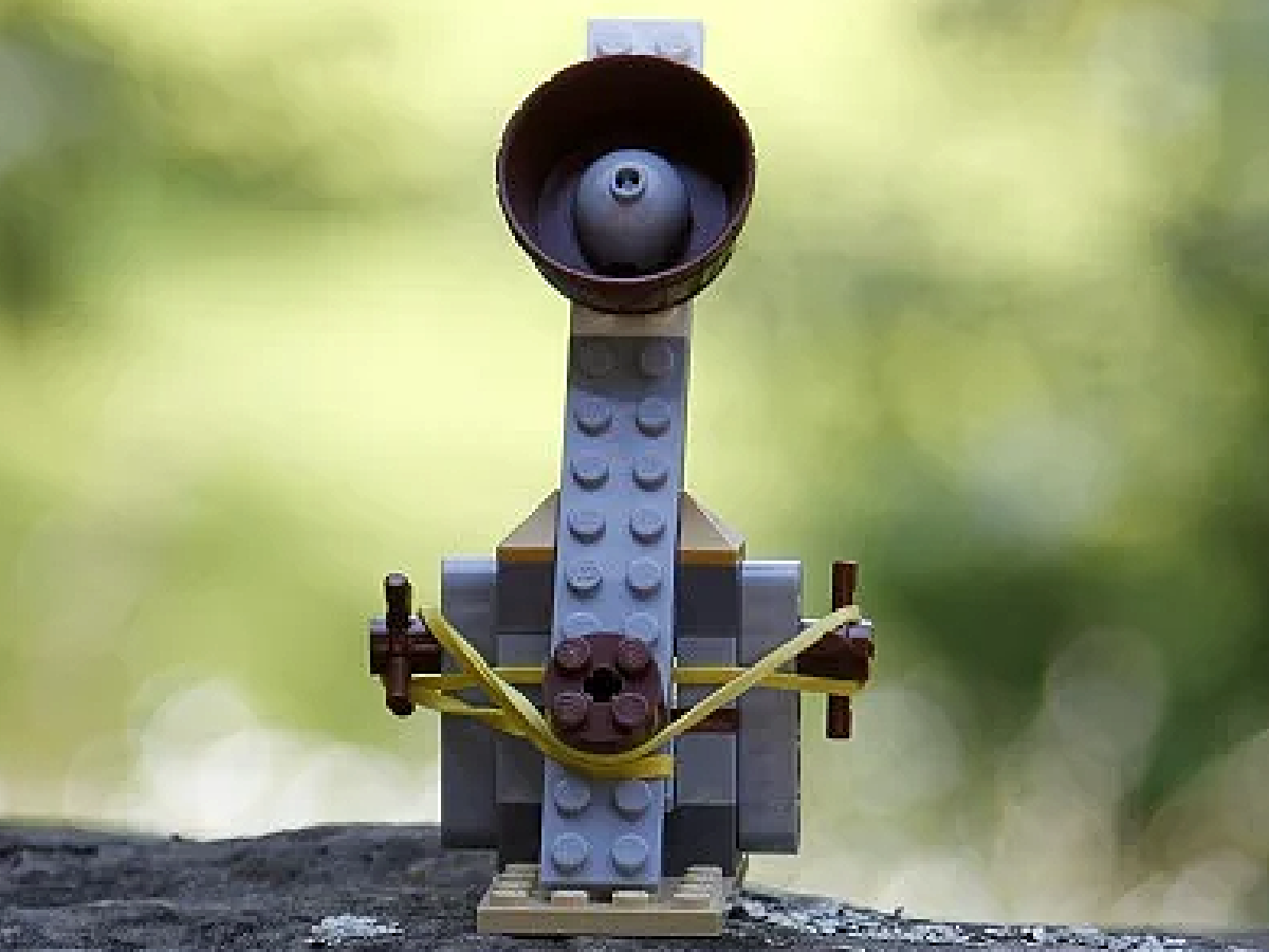 Catapult craft- lego brown and gray catapult with rubber bands- kids activities blog