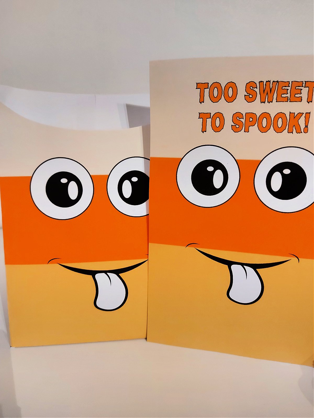 Halloween Treat Bag- step 3- cut out matching Halloween card- kids activities blog