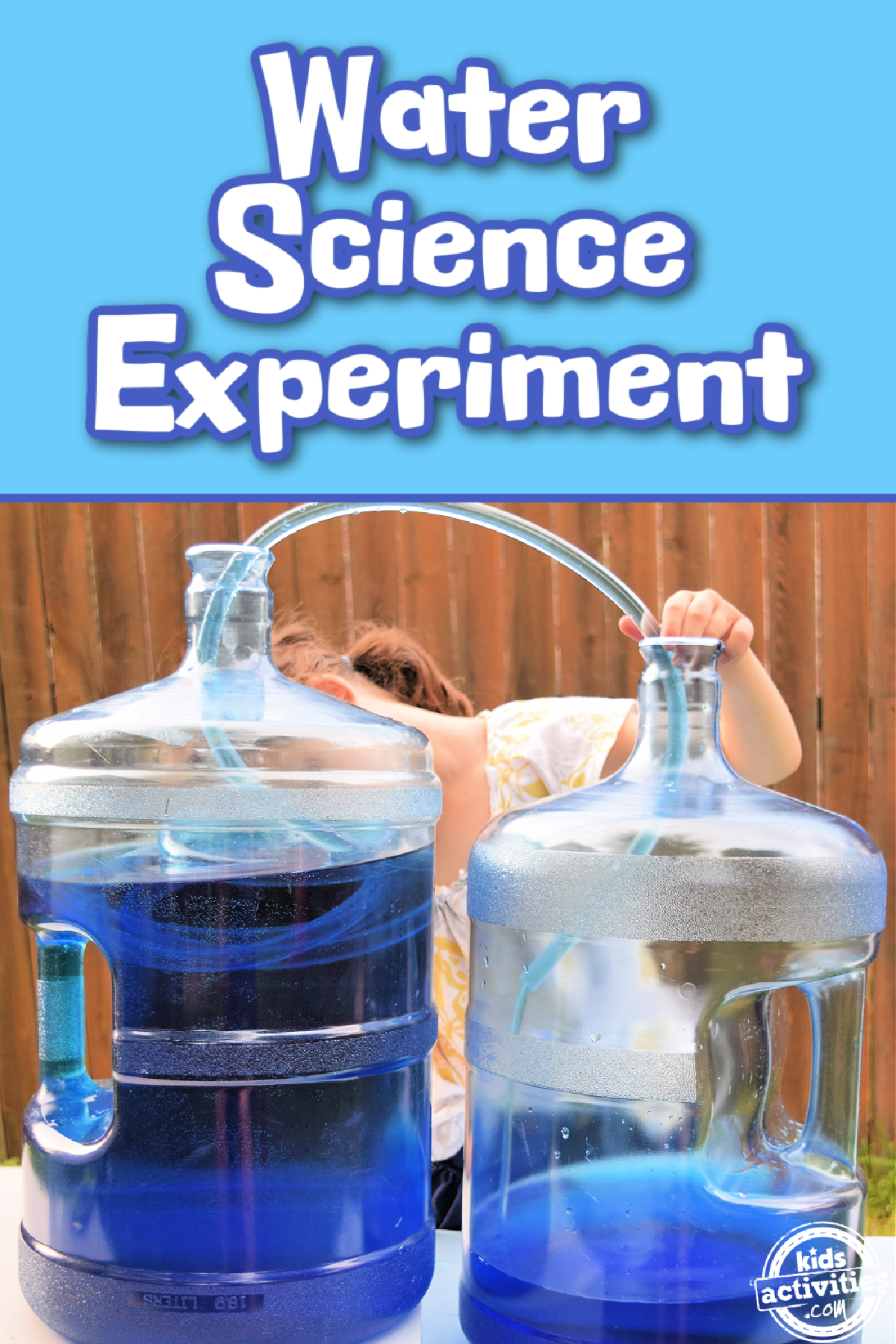 Science Experiment- water siphon with containers, tubing, and water, and little girl outside- kids activities blog