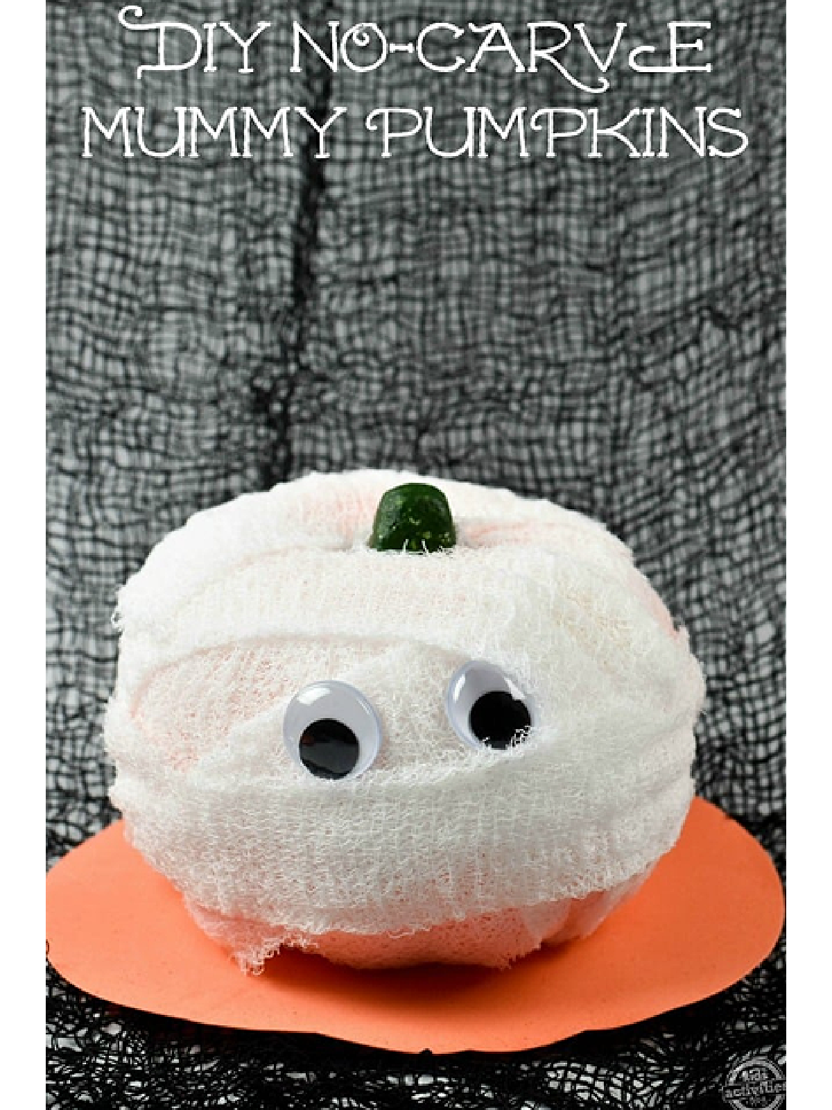 No Carve Ideas- gauze wrapped pumpkin with googly eyes-Kids Activities Blog
