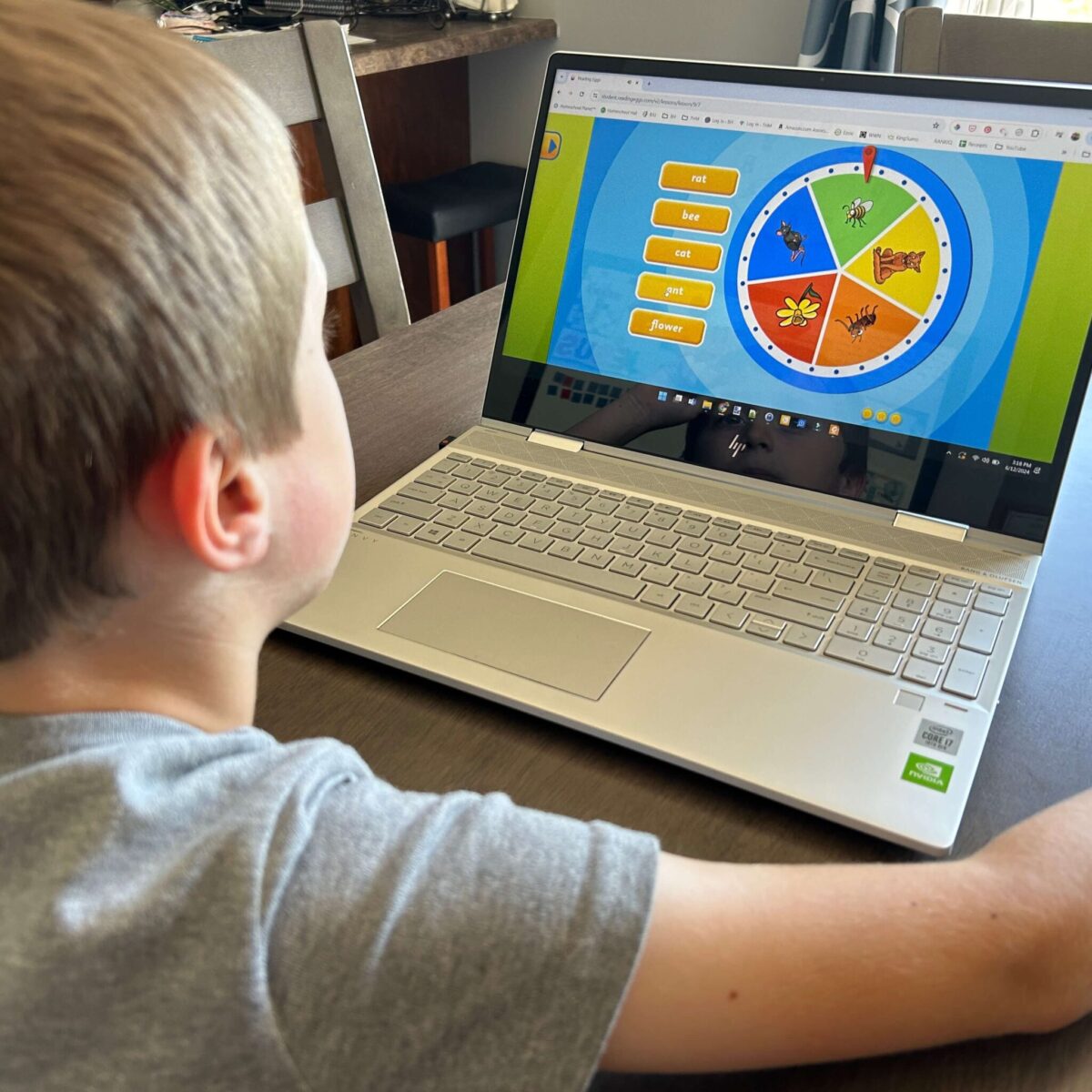 child on Reading Eggs curriculum lesson on computer