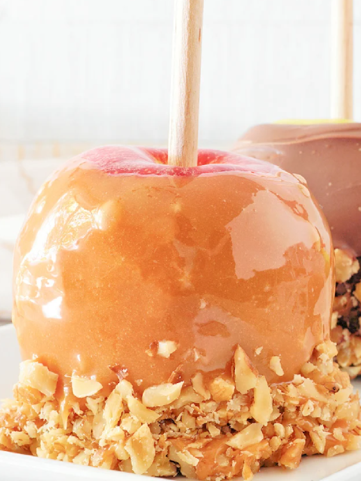 Halloween alternatives- caramel appl with nuts on a stick- kids activities blog