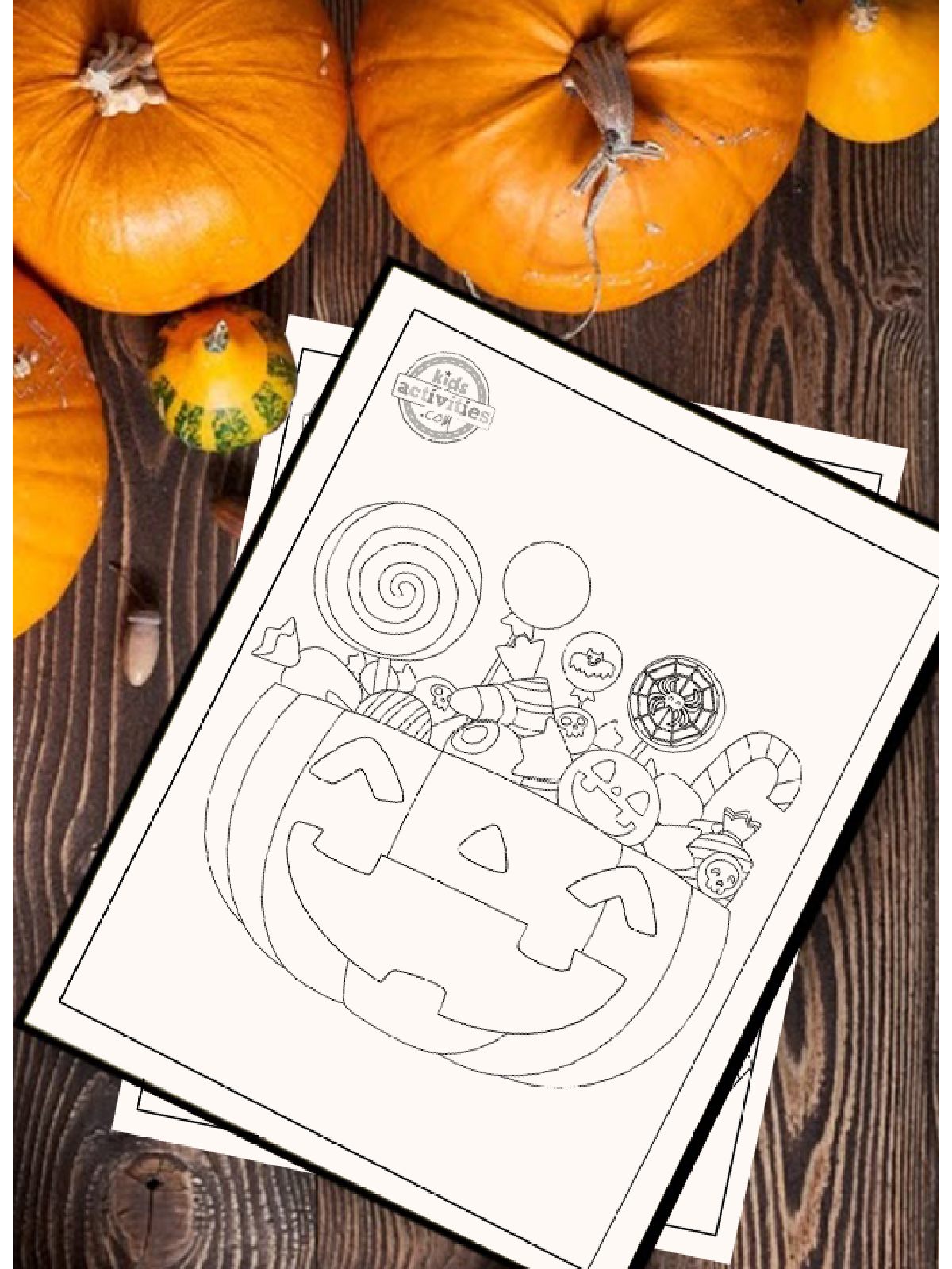 Halloween Coloring Page- jack o lantern with candy coloring page with festive background - Kids Activities Blog