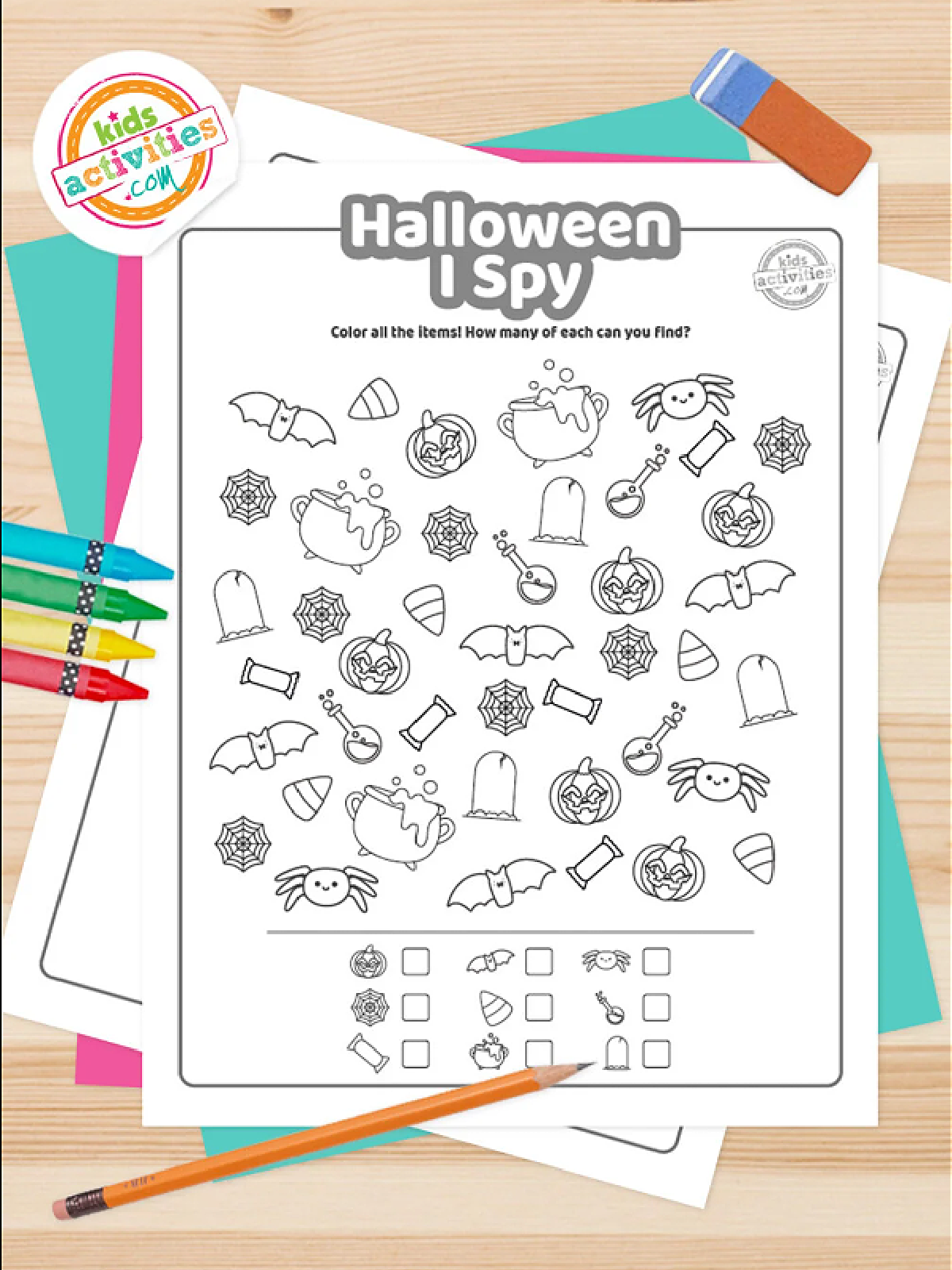 Halloween Puzzles- I spy worksheet on a white background with colorful accessories- Kids Activities Blog