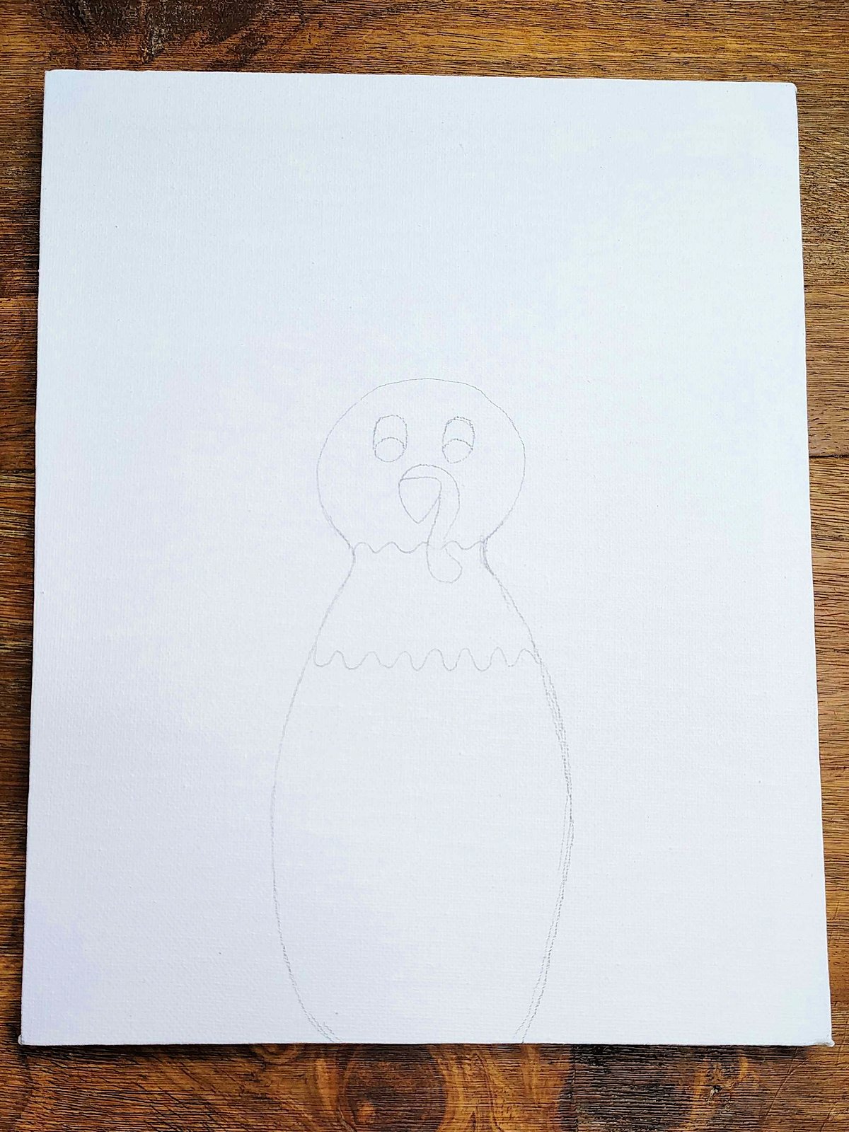 Turkey Painting- Step 1- Draw the body of the turkey on a canvas with pencil- Kids Activities Blog