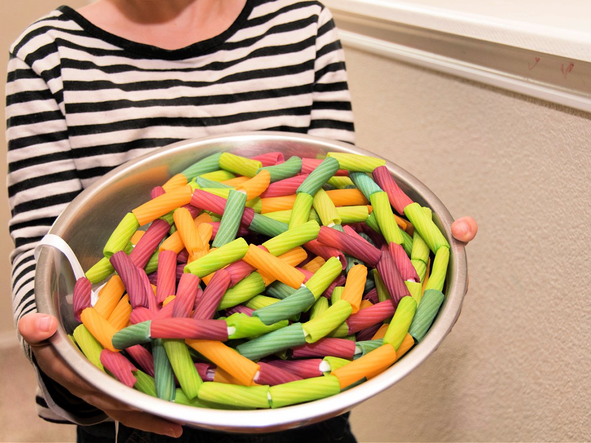 Pasta Fountain Science Experiment- step 2- Put string and noodles in a bowl - Kids Activities Blog