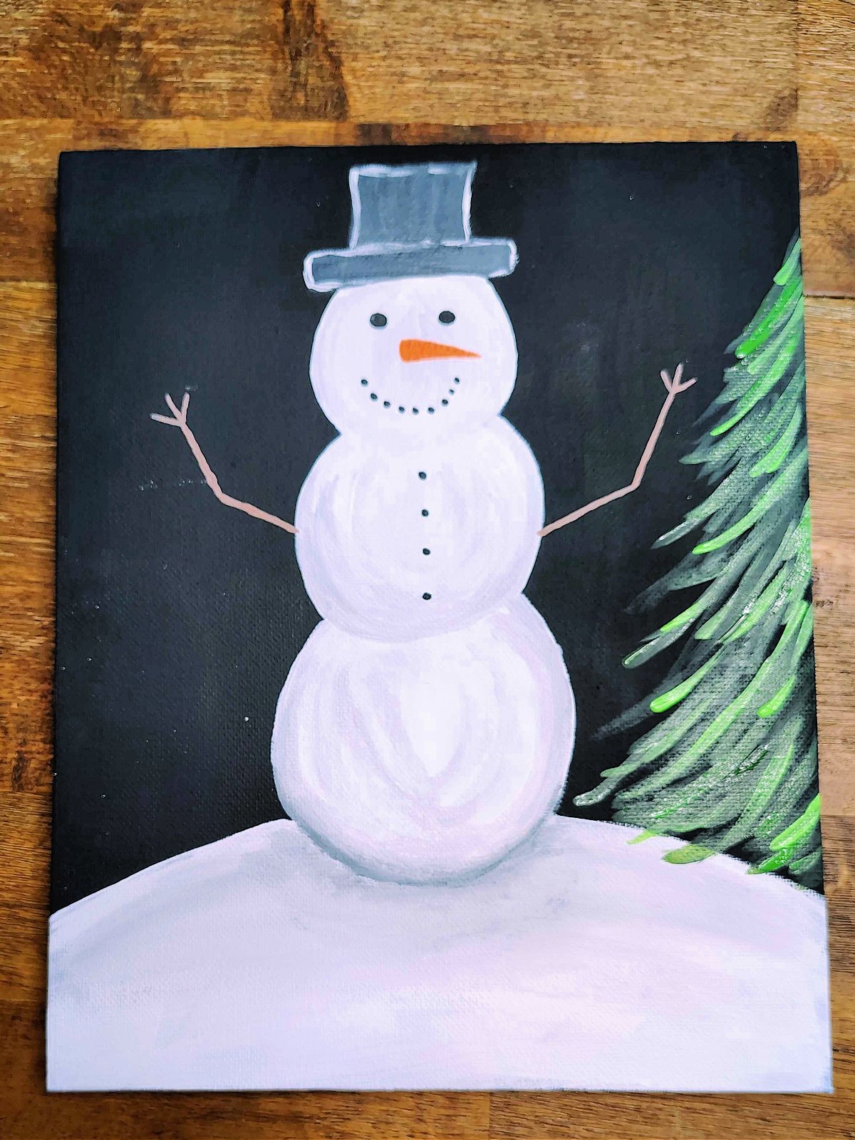 Snowman Craft- Step 10- brighter green added to tree - Kids Activities Blog
