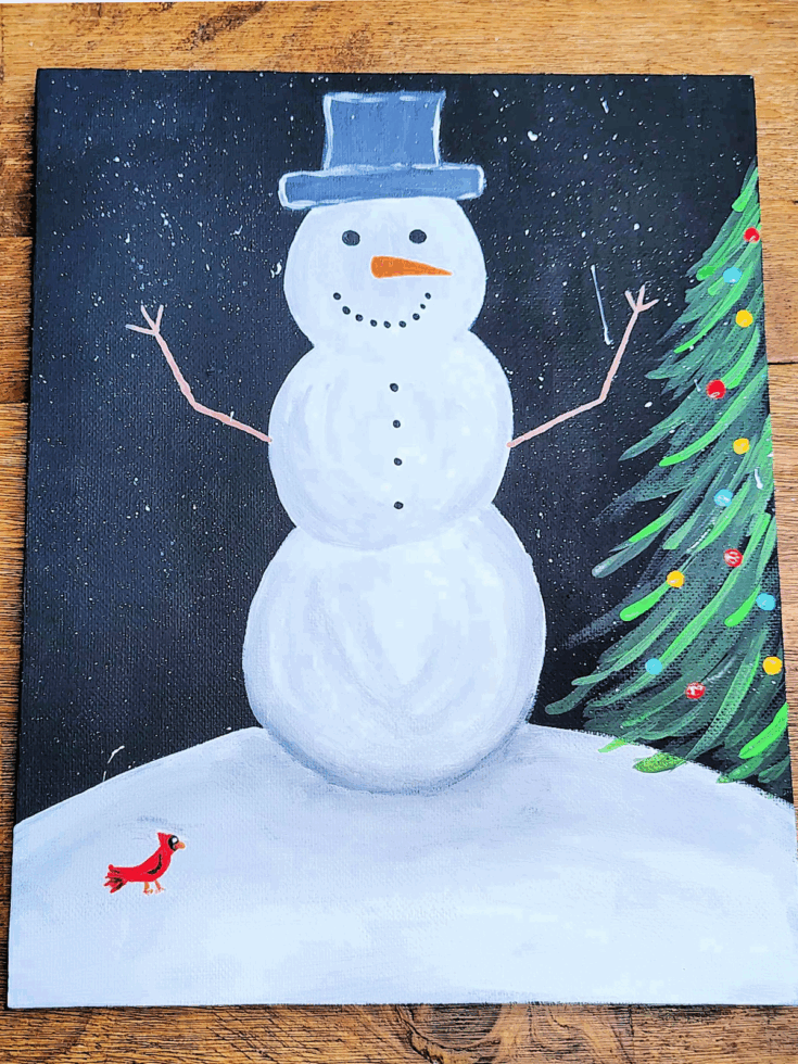 Snowman Craft- Step 12- snow added to the painting - Kids Activities Blog