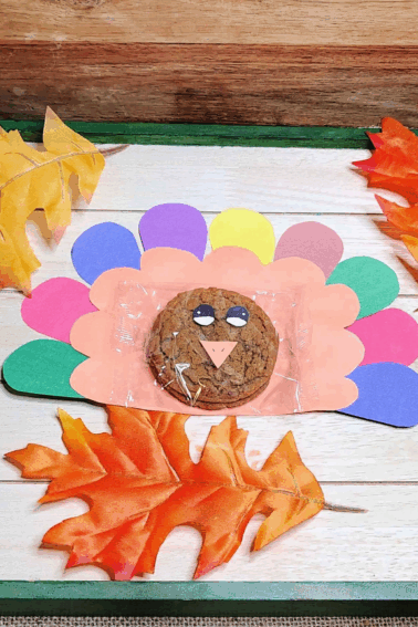 Turkey craft made with cookies and construction paper- kids activities blog