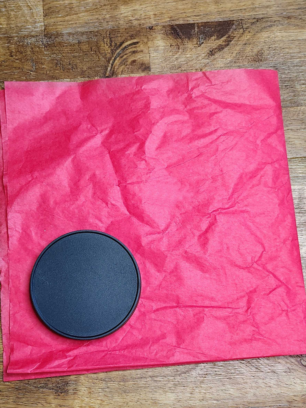 Veterans Day Poppy Craft- Step 2- Black lid traced on red paper - Kids Activities Blog