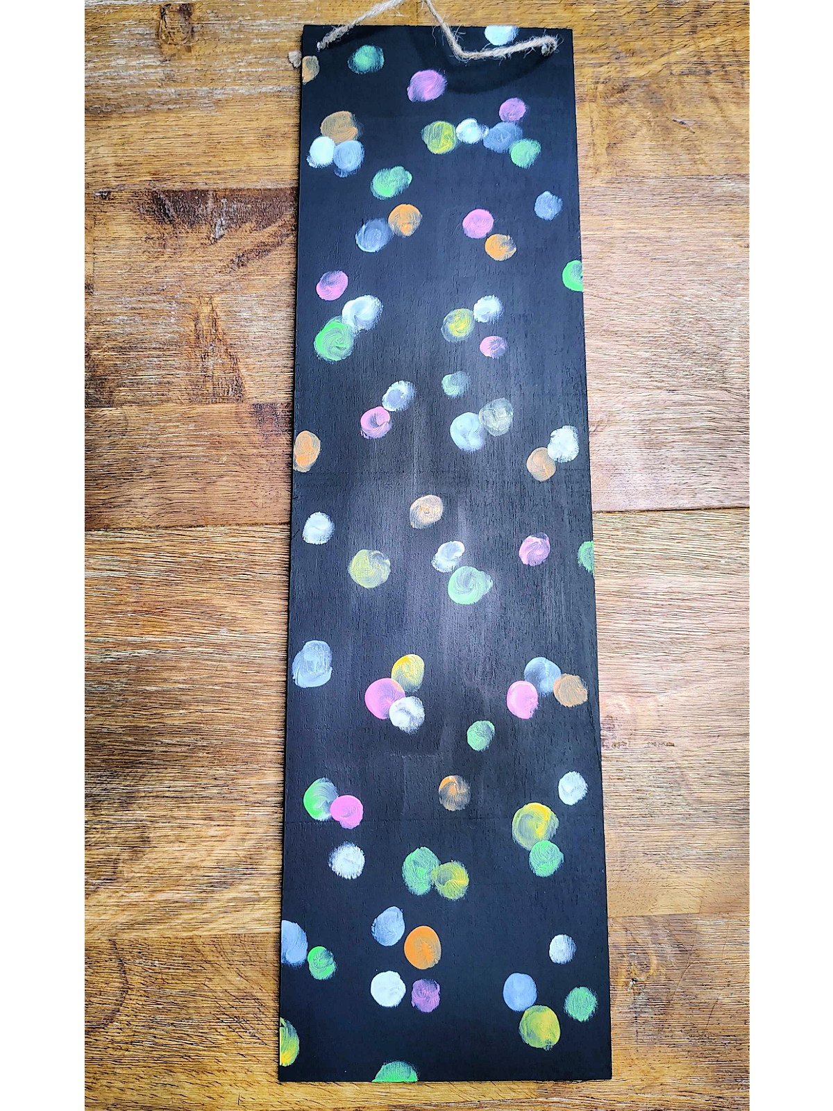 Ornament Painting- Step 2- Finger painting with blue, green, pink, white, yellow, and orange- Kids Activities Blog