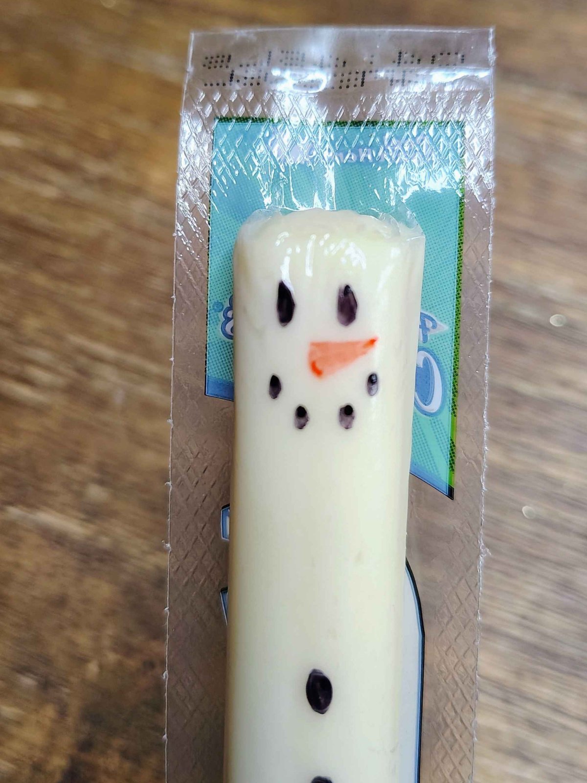 Christmas Snacks Craft- Step 9- Make an orange carrot nose- Kids Activities Blog