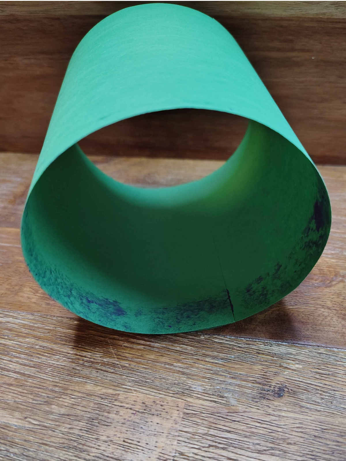 Christmas Tree Treat Bags- Step 3 - Glue one end of the cylinder- Kids Activities Blog