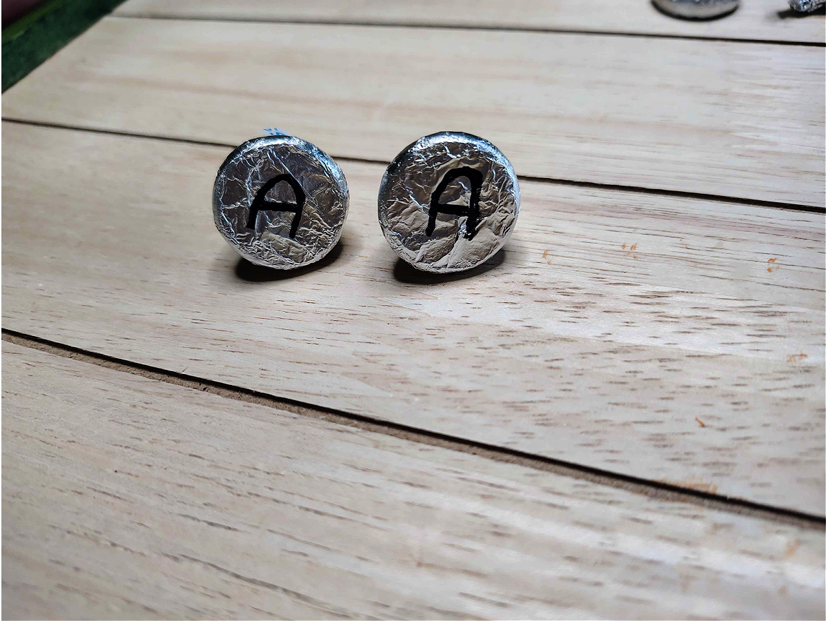 Memory Game- Step 2- Mark the bottom of kisses with A- kids activities blog