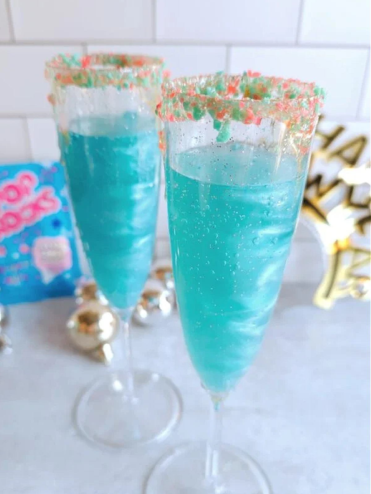 New Years Eve Mocktails-sparkly blue liquid with poprocks -Kids Activities Blog