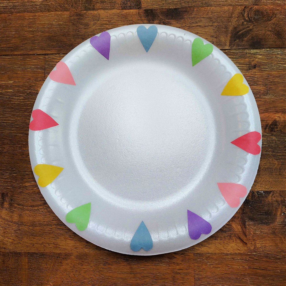 Bible Craft- Step 3- Glue colorful hearts over dots on paper plate - Kids Activities Blog