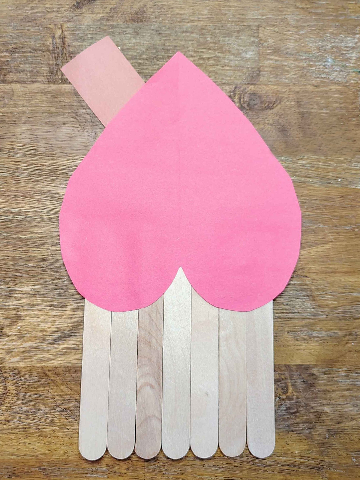Valentine's Day Craft- Step 4- Glue rectangle to heart.- Kids Activities blog