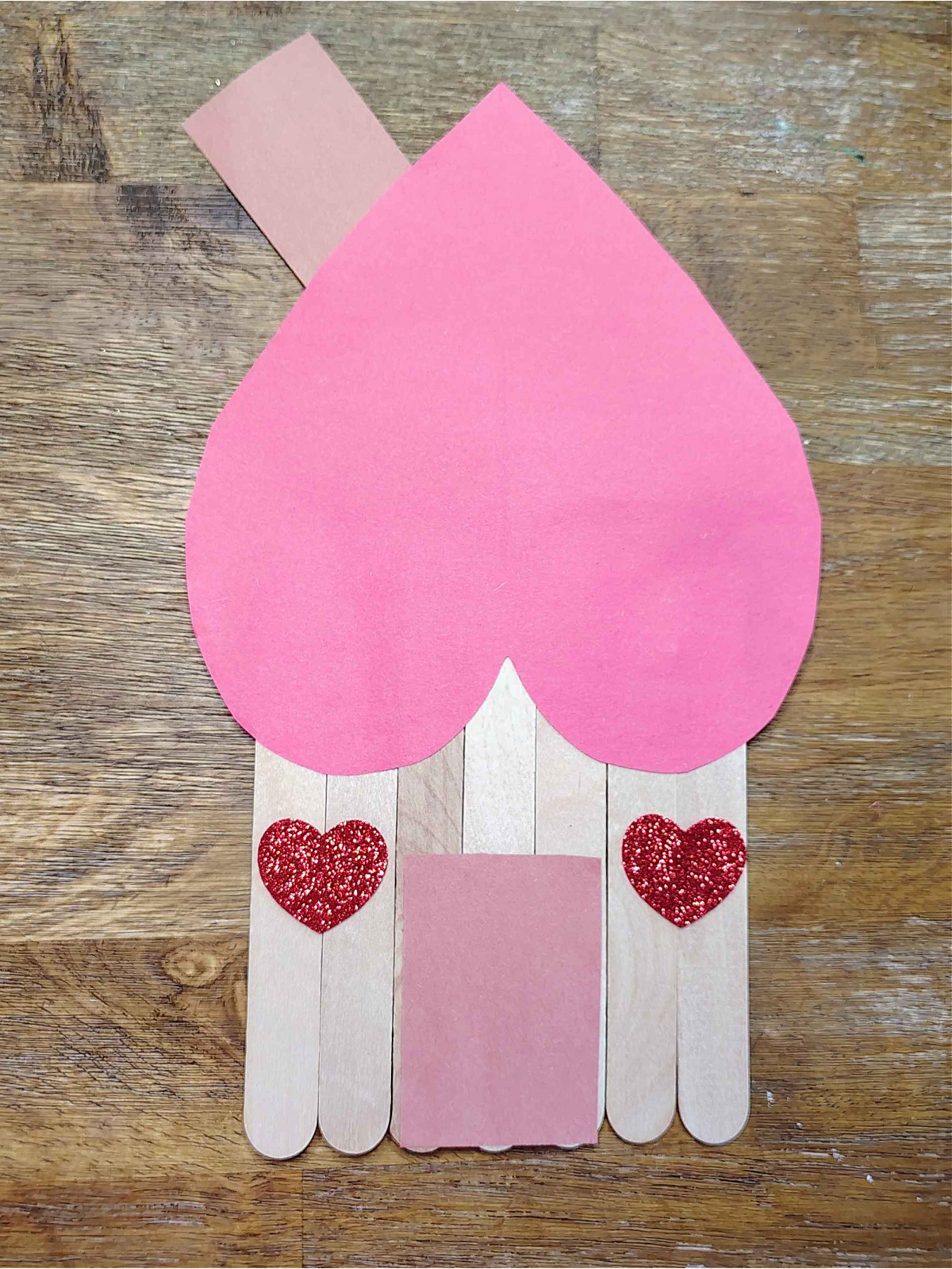 Valentine's Day Craft- Step 6- Add heart windows- Kids Activities blog