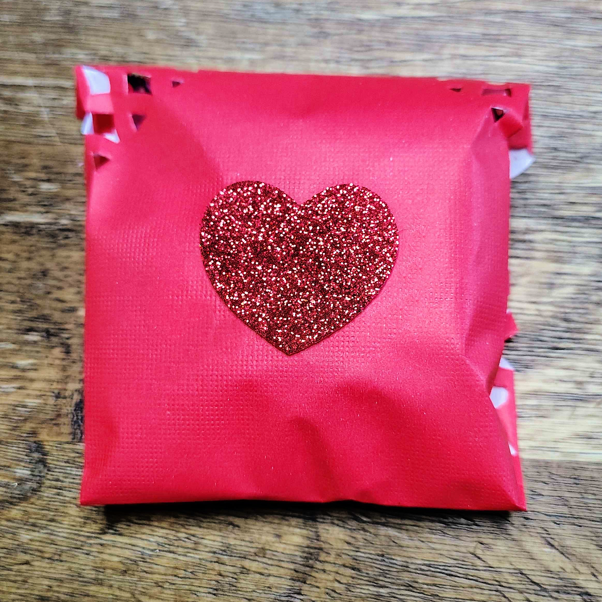 Valentines Envelopes- Step 7- Front decorated with red sparkle heart - Kids Activities Blog