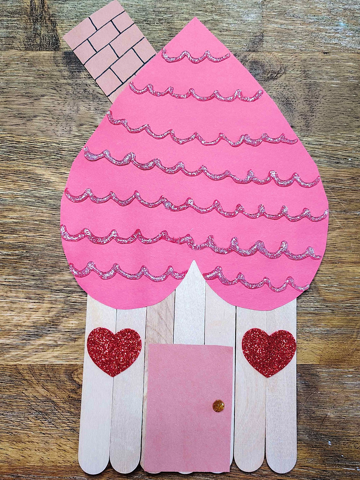 Valentine's Day Craft- Step 8- Add glitter tiles- Kids Activities blog