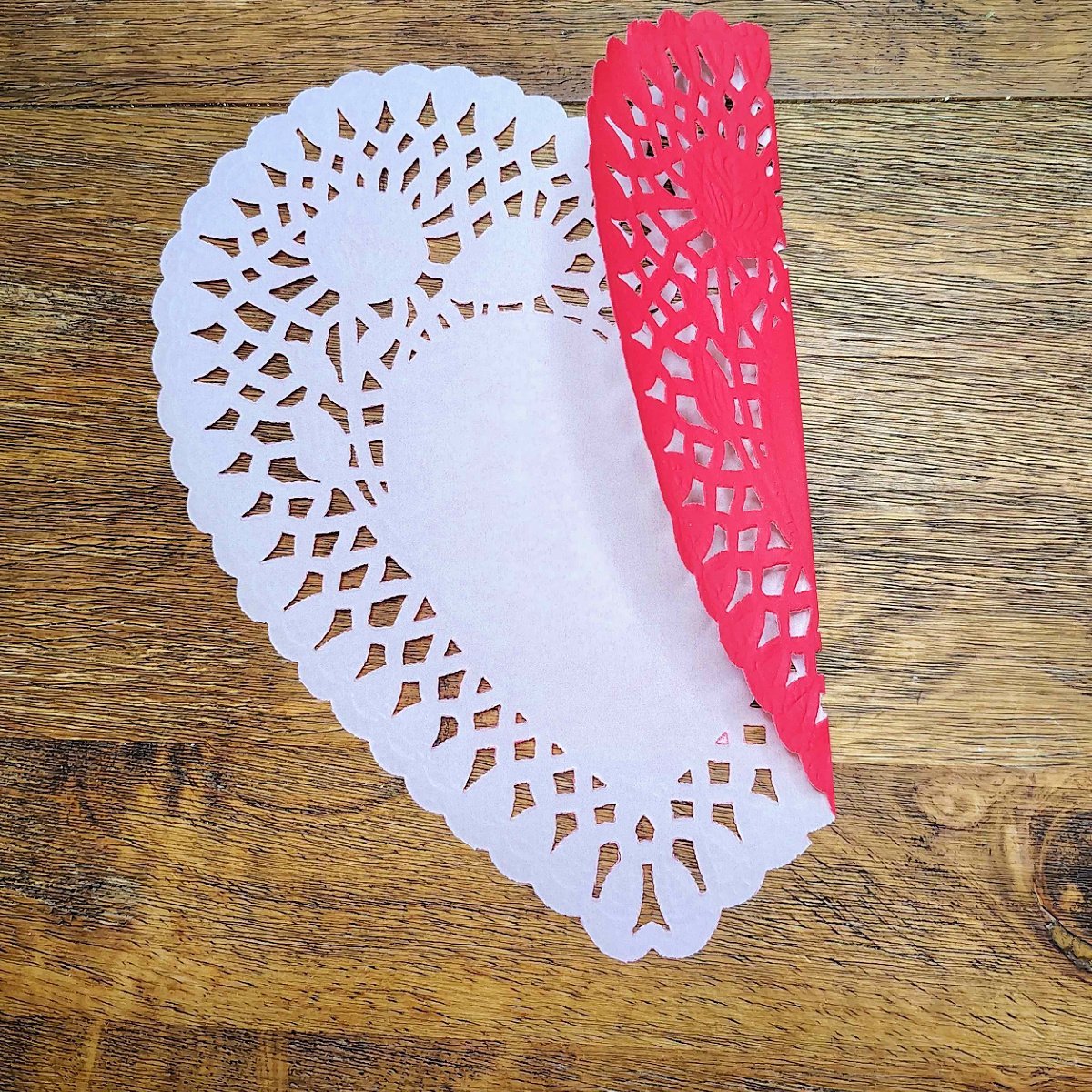 Valentines Envelopes- Step 1- Half the doily folded over- Kids Activities Blog