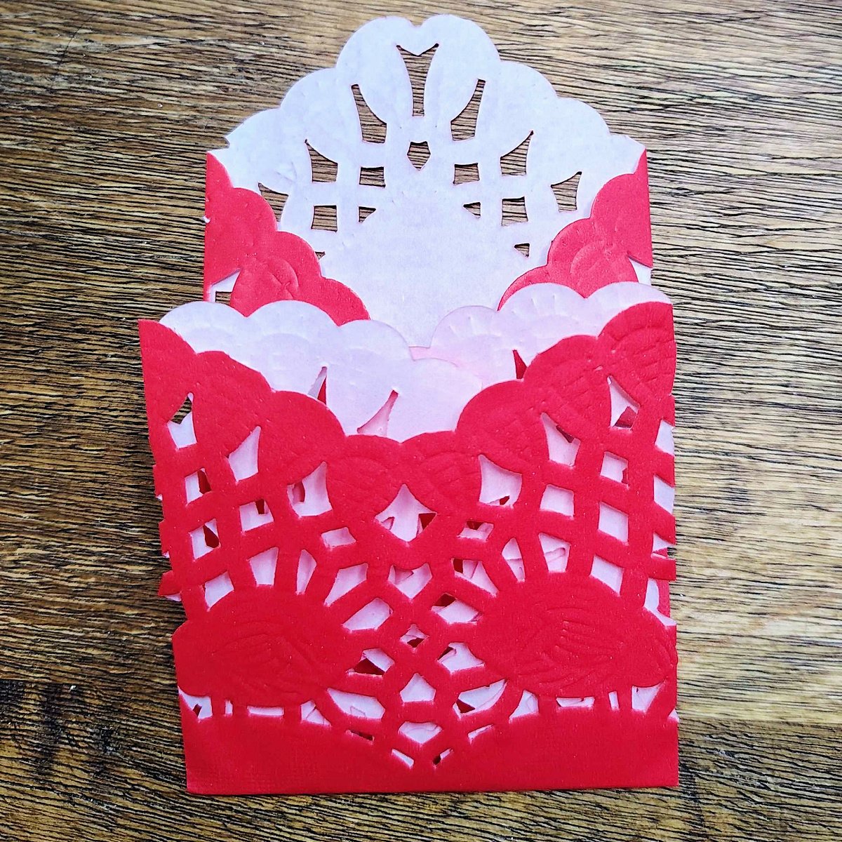 Valentines Envelopes- Step 3- Round part of the doilies folded up - Kids Activities Blog